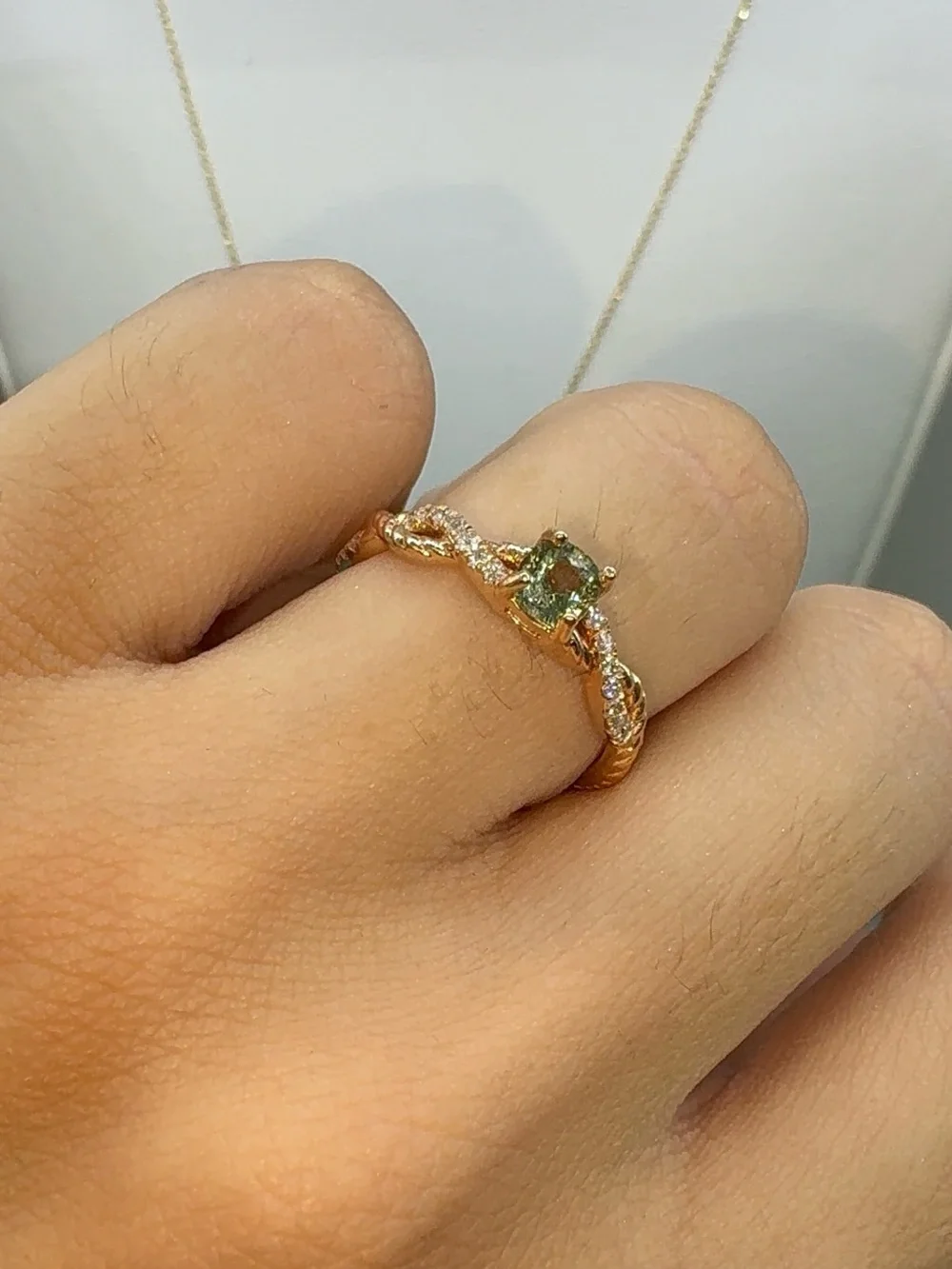 14KT ROSE GOLD DIAMOND AND PERIDOT RING
